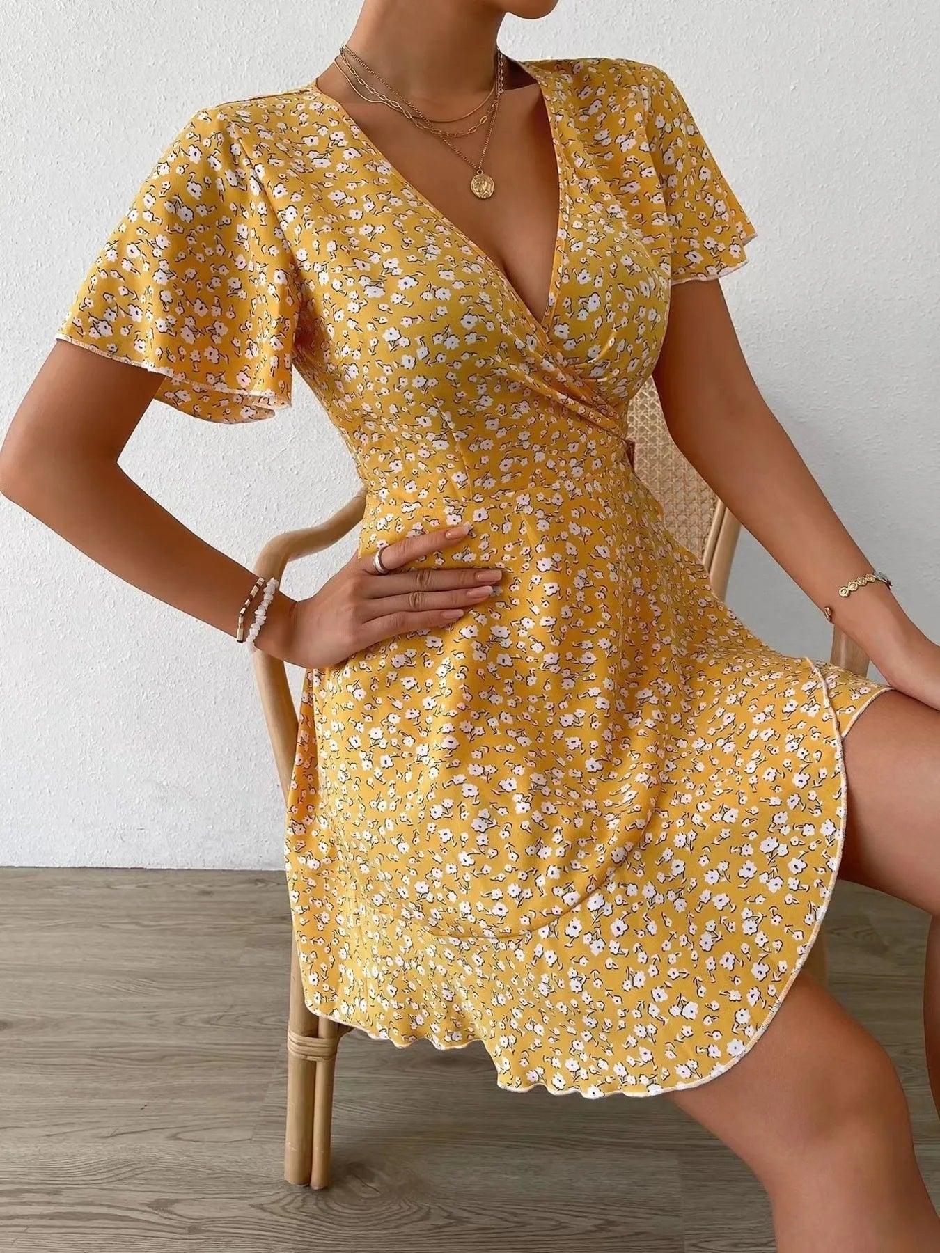 Elaine Floral Flutter Sleeve Wrap Mini Dress