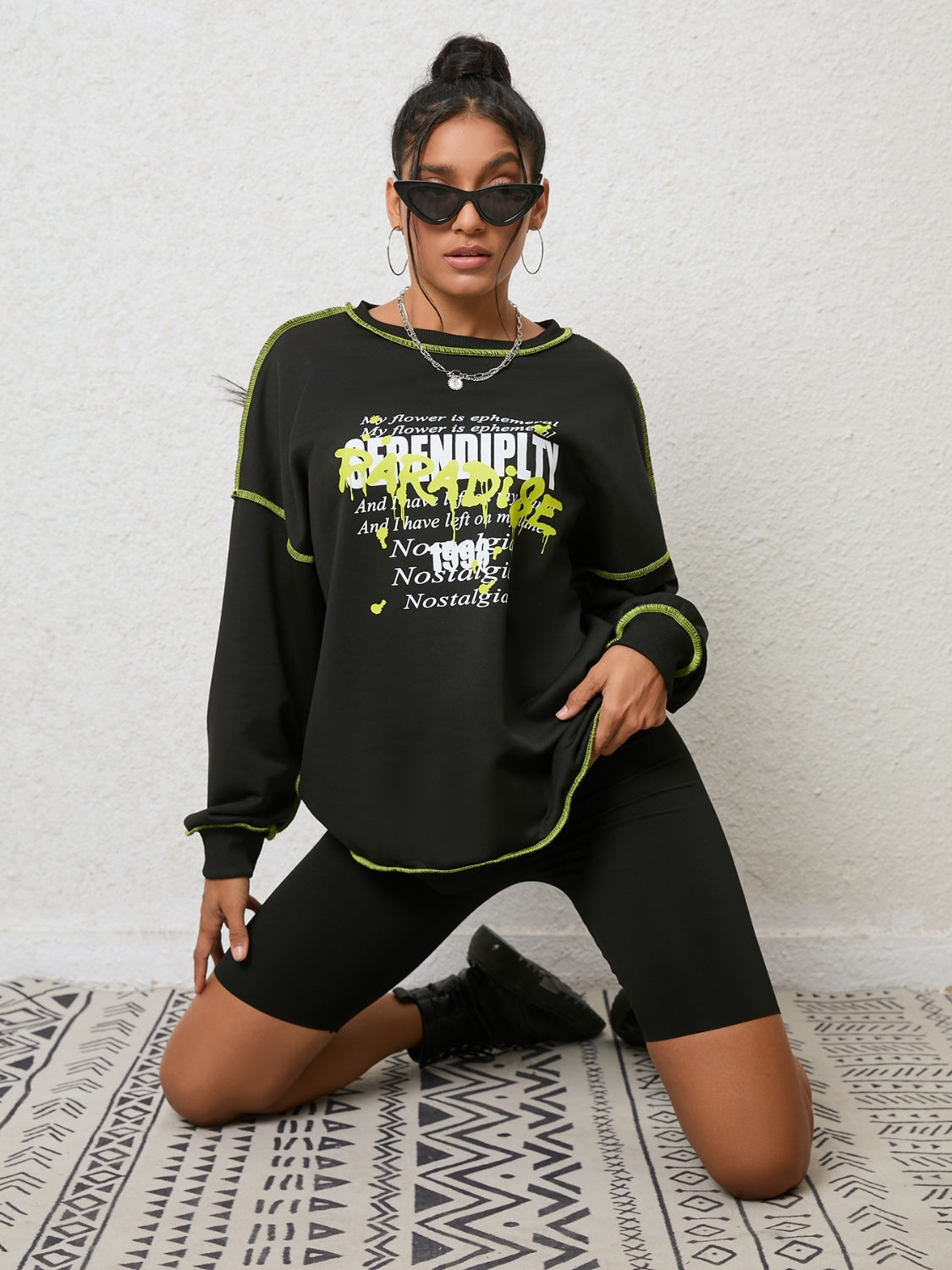 CATHSNNA Graphic Round Neck Sweatshirt